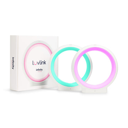LuvLink Infinity friendship lamps in pink, turquoise, and magenta displayed with product packaging, showing connected circular light rings.