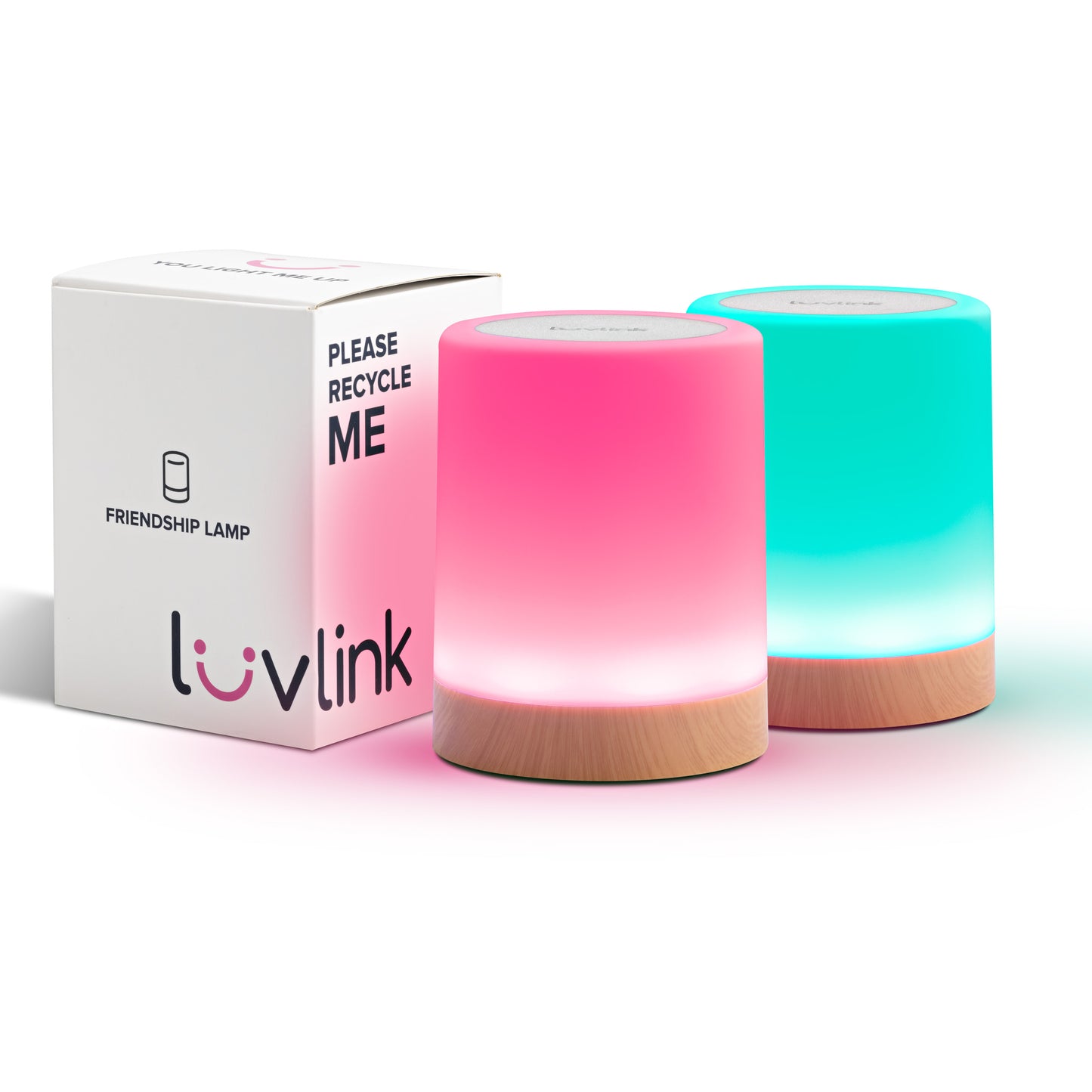 Two glowing LuvLink friendship lamps in pink and turquoise next to white product packaging with wooden bases.